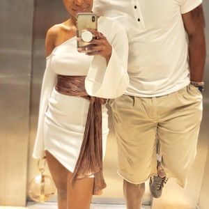 White long sleeved mini dress with shimmer sash belt